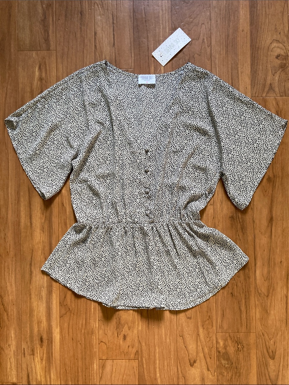 Sienna Sky Cream and Black Speckled Peplum Blouse